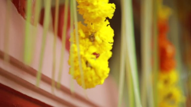 Wedding ceremony, traditional indian hindu marriage ritual with red flowers and attributes