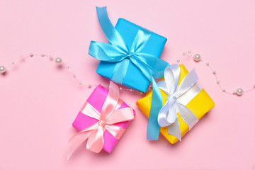 Birthday gifts on color background