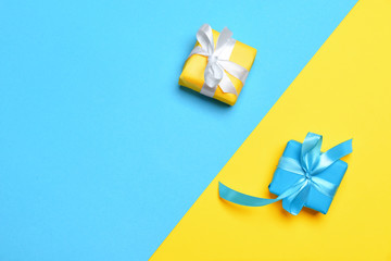 Birthday gifts on color background