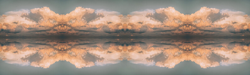 Beautiful dramatic clouds with orange gold sky background. Nature weather, panoramic cloud and sky background
