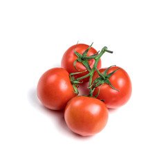 four fresh tomatoes with green leaves isolated on a white background. Juicy red tomatoes. Ripe vegetables. Organic product.