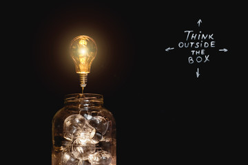 Light bulbs and text on dark background