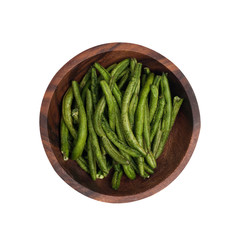 dried beans in a brown wooden plate.