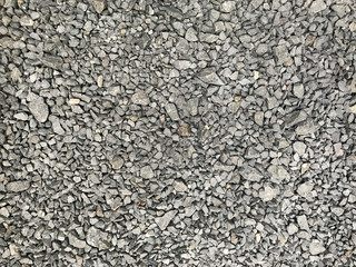 Gray gravel pebble small stones texture background decorative