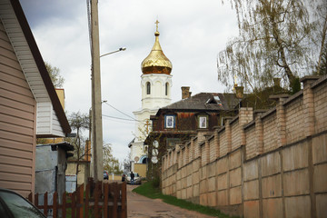 Street road view with golden dome church from bottom up