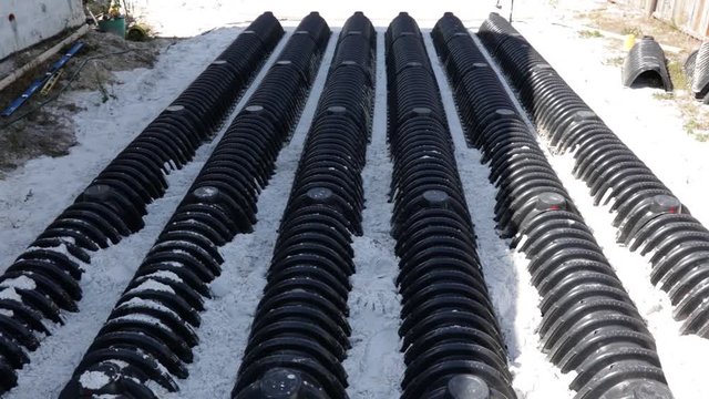 sewage system septic leach field under constructions or leachfield chamber. Pattern of groundwater pipe. Close-up