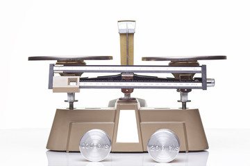 A triple beam balance used to measure the mass of materials.