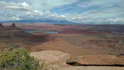 Potash Ponds and the La Sal mountains in the distance at Dead Horse Point, Utah