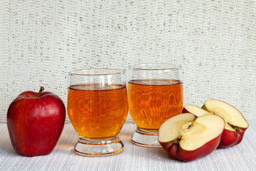 Two glasses of apple juice