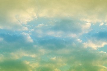Soft cloud background with pastel colors in the multicolored sky