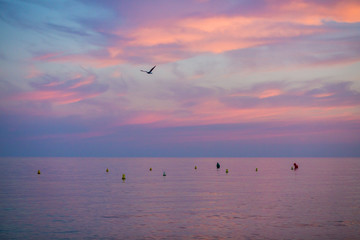 sea at sunset with purple colors