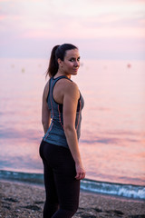 woman doing sports on the beach