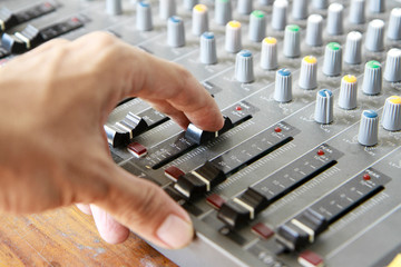 hand tuning on Audio sound mixer console