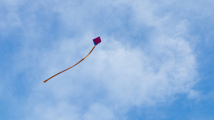 kite flying in the blue sky