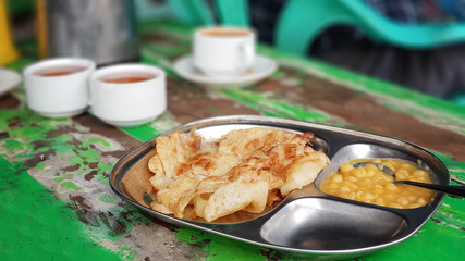 roti prata with mashed bean sauce