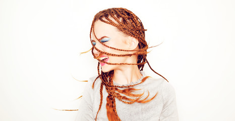 Girl with dreadlocks, pigtails dancing, model in the style of the 80s. 90s, with bright blue...