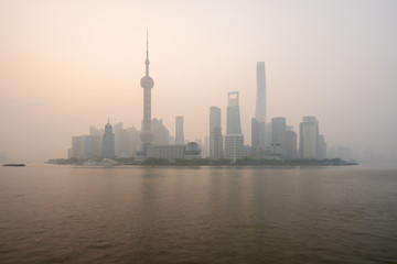 Fototapeta na wymiar Scenic Panoramic Cityscape of Shanghai, China during foggy morning weather with tall and unique skyscrapers making up the skyline 