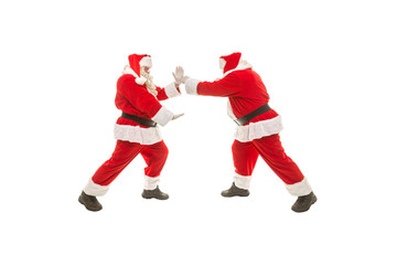 Plakat Battle of Santa Clauses on a white background