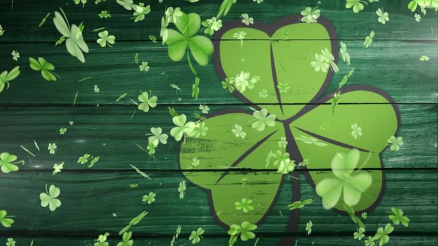 Animation of clovers falling with light green clover leaf on background