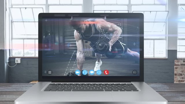 Animation of tablet computer showing a Caucasian man exercising. Coronavirus  spreading