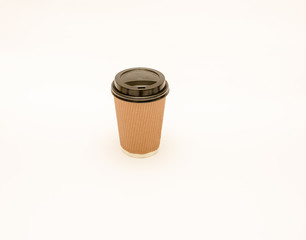 Recyclable take out coffee or teacups with lids isolated against a white background.