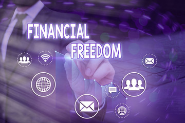 Conceptual hand writing showing Financial Freedom. Concept meaning Having money Free from worry...