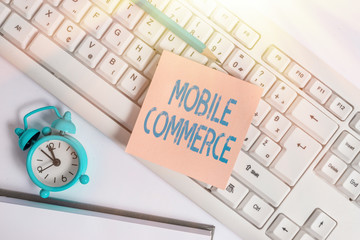 Handwriting text Mobile Commerce. Conceptual photo Using mobile phone to conduct commercial...