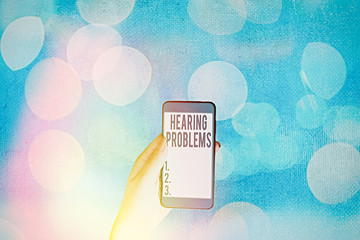 Handwriting text Hearing Problems. Conceptual photo is partial or total inability tolisten to...