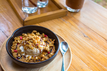 ice cream with Dried grains on hot skillet cookie,Delicious dessert