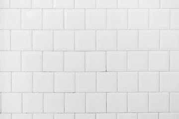 Naklejka premium White tile interior wall background.