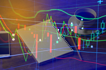 Double exposure of business man working at home with laptop and financial stock market graph background. Business Trading  market concept.