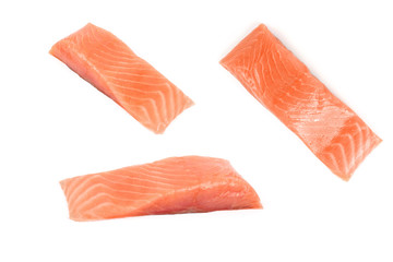 several pieces of red fish isolated on a white background