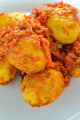 Telur balado (spicy eggs). indonesian food made from eggs, chili, tomatoes, garlic and other and other ingredients