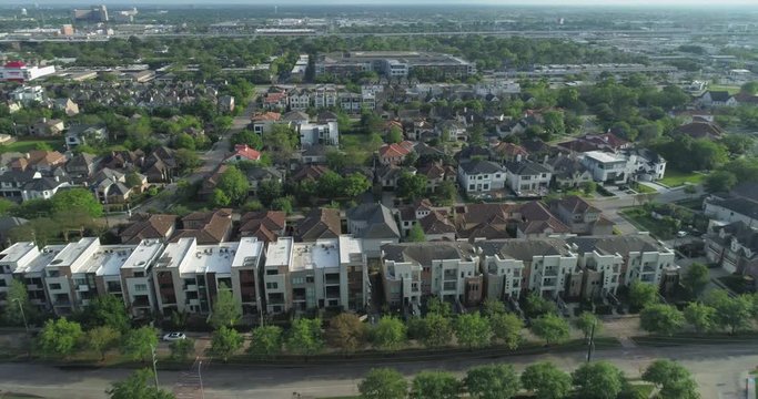 Aerial view of affluent homes in the Uptown Galleria area in Houston.  This video was filmed in 4k for best image quality.