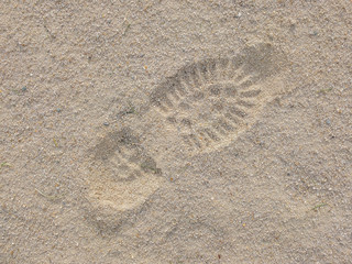 Footprint shoe on beach 