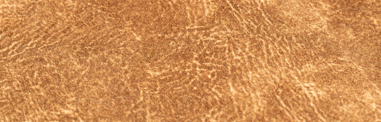 brown faux suede leather for the concept and style idea of fine leather craft, handmade work space.
