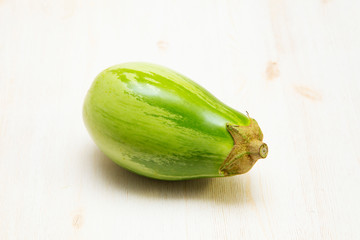 A green eggplant on the white background