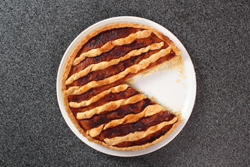 Shoofly Tart with Golden Syrup Filling on Granite Surface