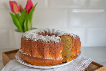 freshly baked curd cheese gugelhupf with powdered sugar