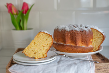 freshly baked curd cheese gugelhupf with powdered sugar