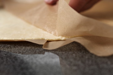 Removing baking parchment. Making Cider Pie Series.