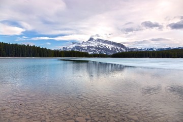 Two Jack Mountain Lake Early Springtime Scenic Landscape View. Banff National Park, Alberta, Canadian Rocky Mountains