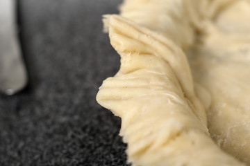 Press edges pastry dough with fork. Making Cider Pie Series.