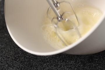 Whisking egg whites with handheld mixer. Making Cider Pie Series.