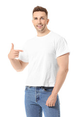 Man in stylish t-shirt on white background