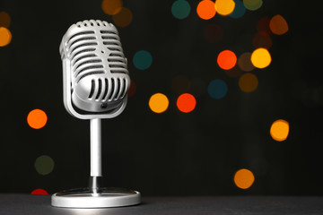 Retro microphone on dark background