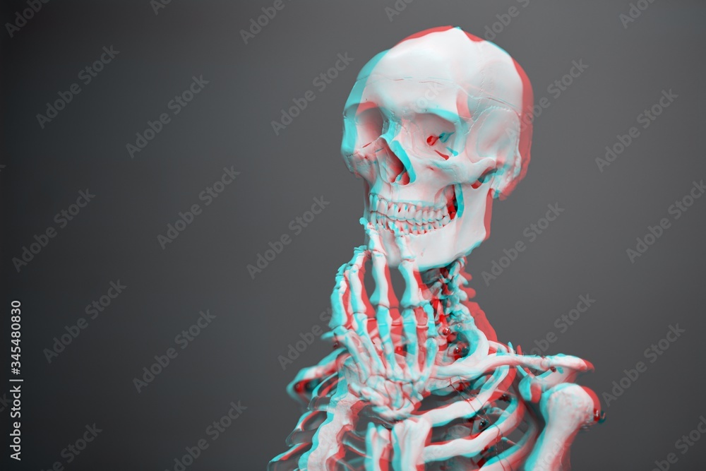 Poster beautiful shot of a skeleton isolated on a gray background with a 3d effect