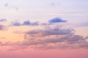 Summer morning or evening mystic sky. Nature magic pink lilac cloudscape. Amazing sunset pastel scenery.