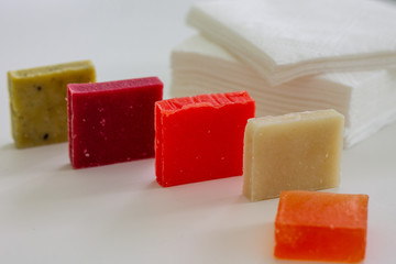 Pieces of handmade soap, paper napkins