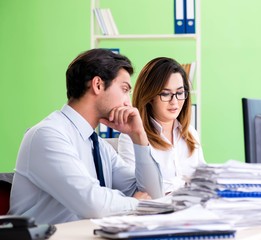 Fototapeta premium Two colleagues working in the office